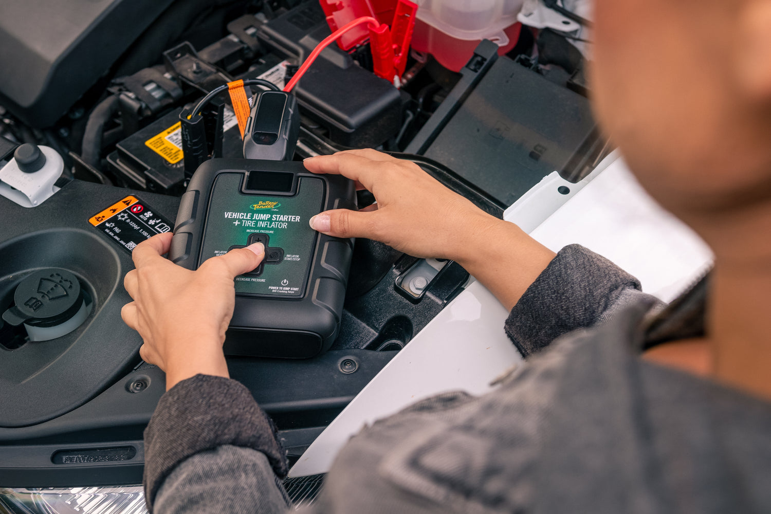 Battery Tender® jump starter providing roadside battery rescue during a road trip.