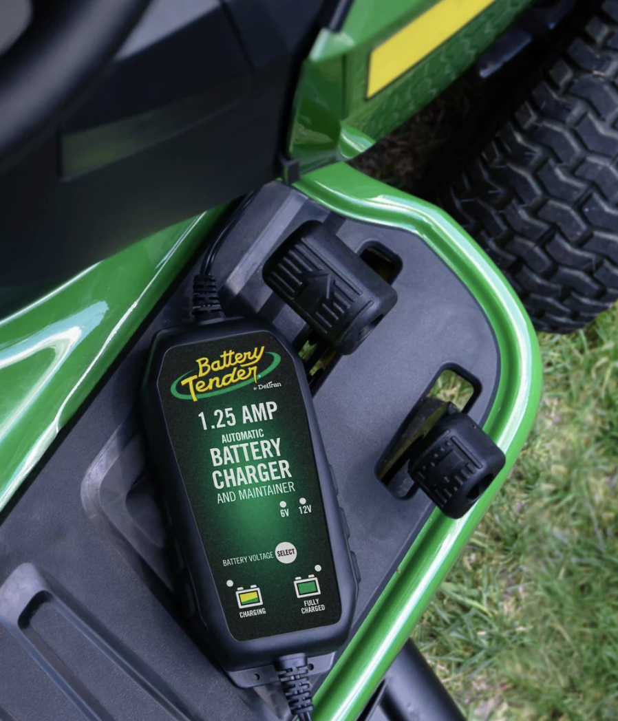 Battery Tender Plus 1.25 AMP Selectable 12V/6V Battery Charger and Maintainer on a Lawn Mower