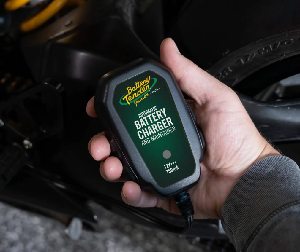 Person Holding the Junior 750MA 12V Battery Charger and Maintainer