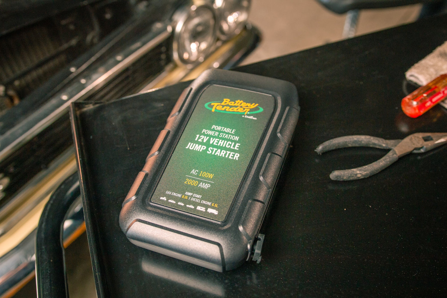 Battery Tender® portable lithium jump starter on a workbench